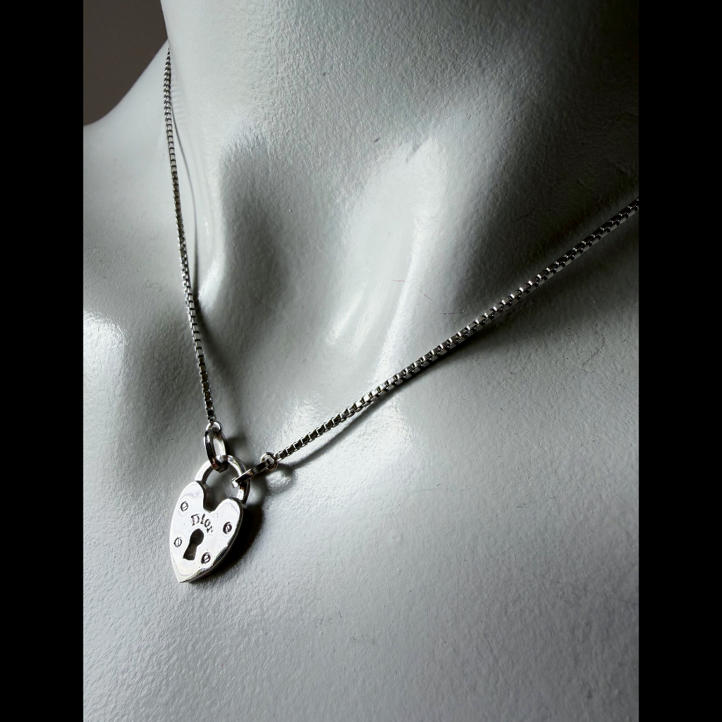 Christian Dior Silver Heart Lock Charm Necklace — vintage 2000s Christian Dior jewellery in silver