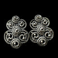 Vintage Schiaparelli costume jewelry clip on earrings.