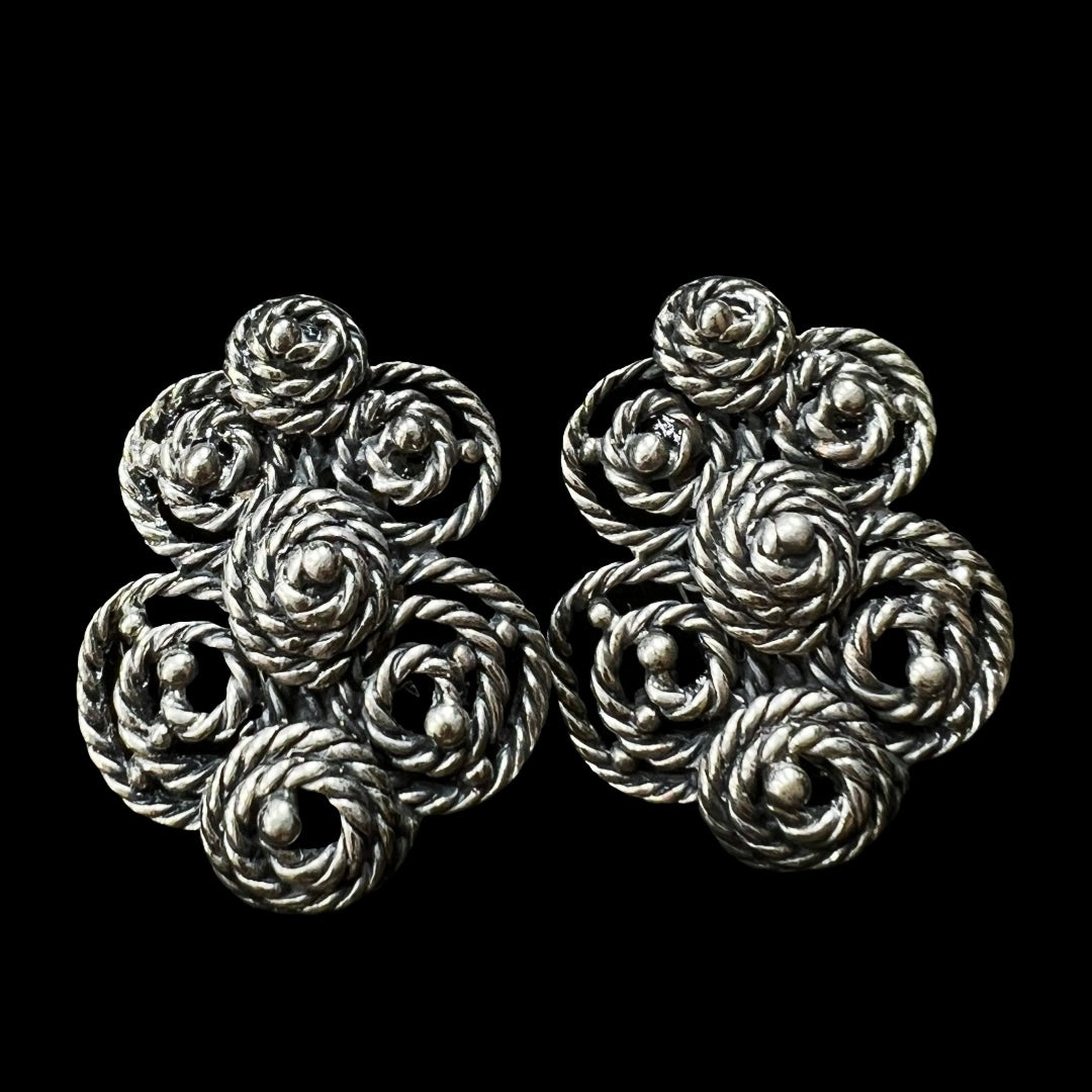 Vintage Schiaparelli costume jewelry clip on earrings.