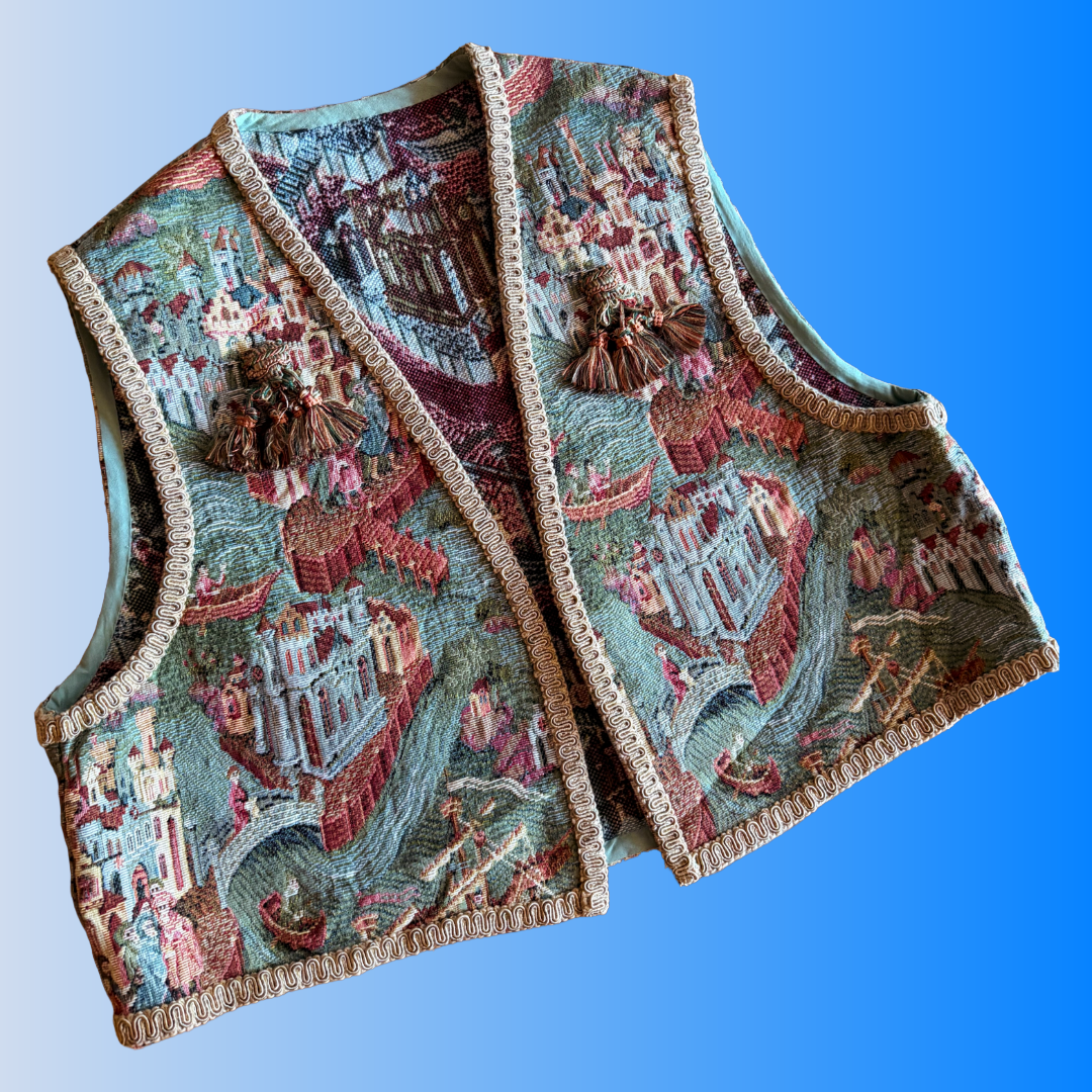 Vintage tapestry vest with tassels depicting a scene of Venice, Italy.