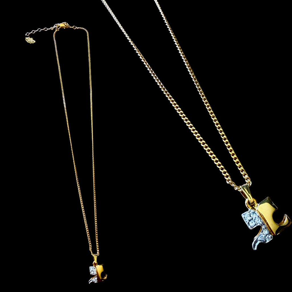 1990s Courrèges Gold and Silver Tone Rhinestone Puzzle Piece Pendant Necklace — vintage 1990s Courrèges jewellery in gold, silver