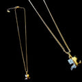 1990s Courrèges Gold and Silver Tone Rhinestone Puzzle Piece Pendant Necklace — vintage 1990s Courrèges jewellery in gold, silver