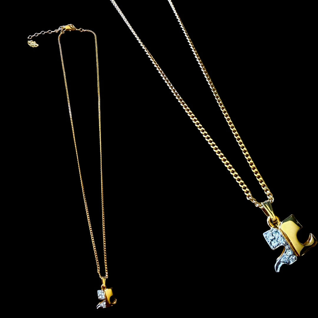 1990s Courrèges Gold and Silver Tone Rhinestone Puzzle Piece Pendant Necklace — vintage 1990s Courrèges jewellery in gold, silver