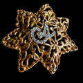 1990s Christian Lacroix Gold Tone Crystal Domed Star Brooch — vintage 1990s Christian Lacroix jewellery in gold