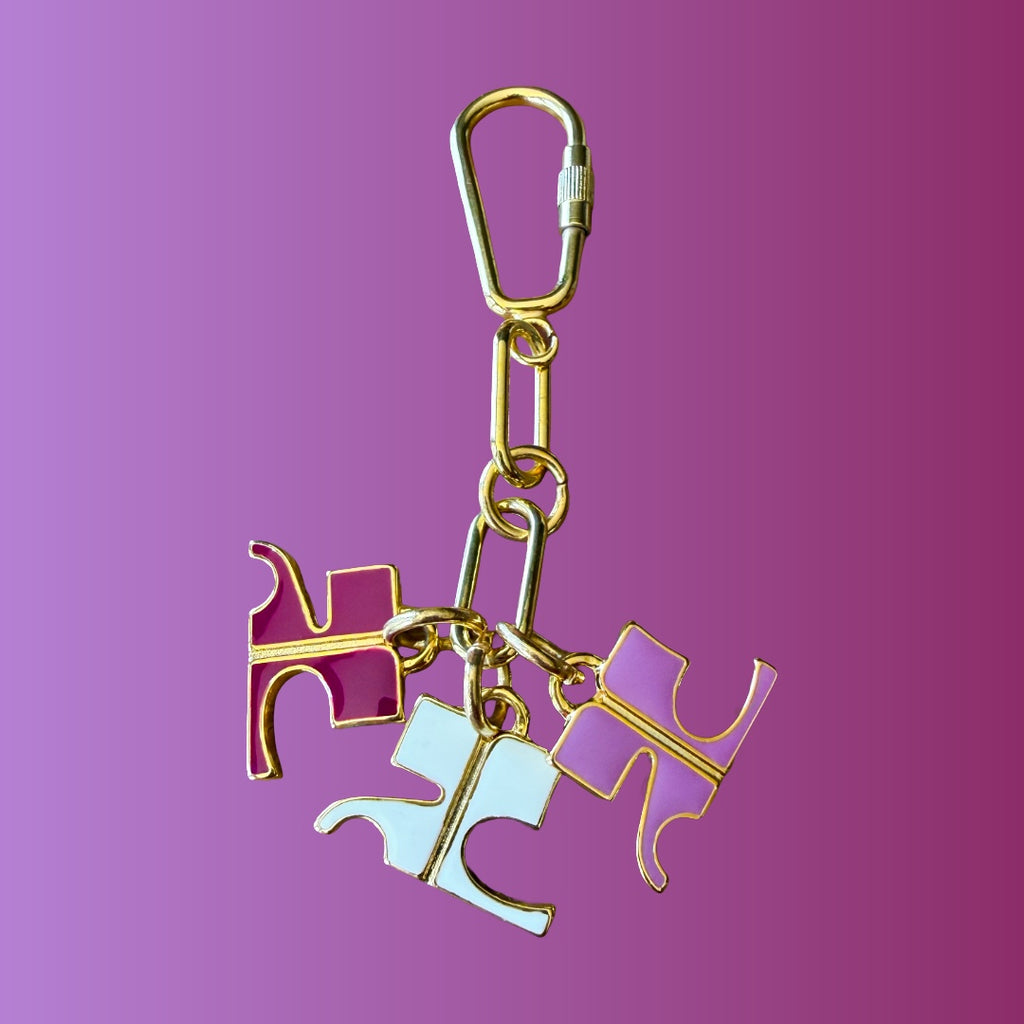 Courrèges 1990s Gold and Pink Enamel Logo Charm Keychain — vintage 1990s Courrèges accessory in gold, pink, purple, white