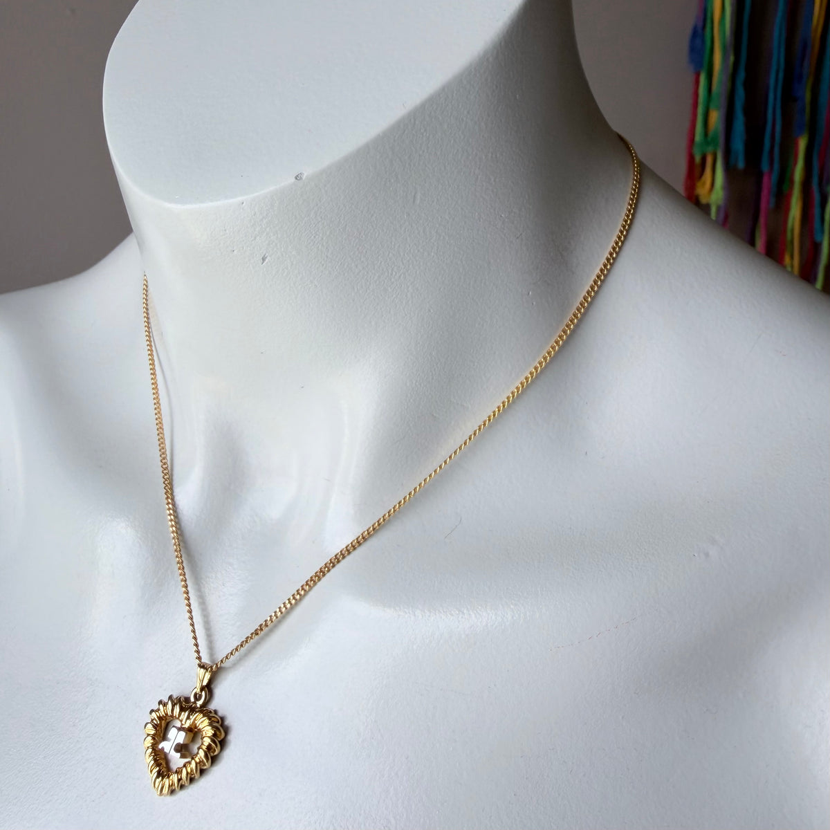 Courrèges Gold Tone Heart Logo Pendant Necklace — vintage 1990s Courrèges jewellery in gold, silver