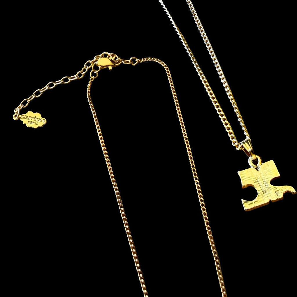 1990s Courrèges Gold and Silver Tone Rhinestone Puzzle Piece Pendant Necklace — vintage 1990s Courrèges jewellery in gold, silver