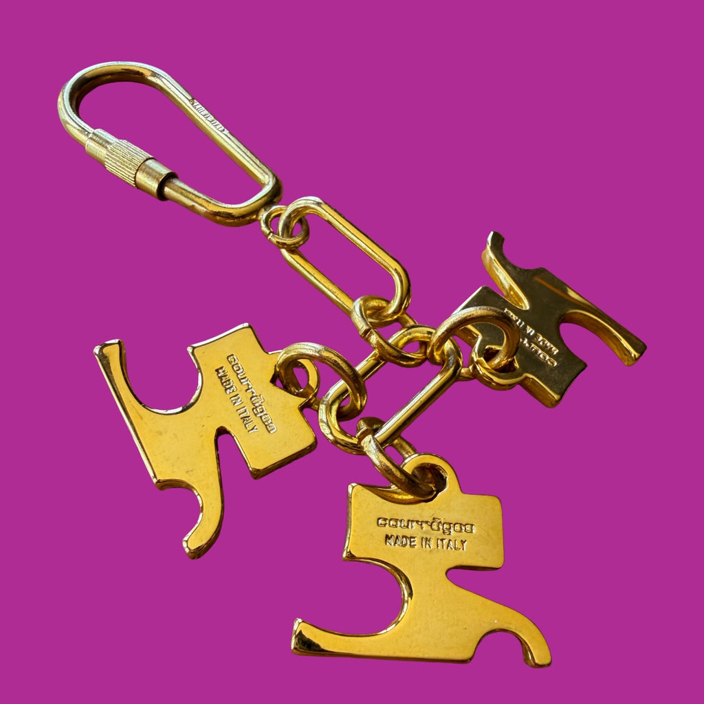 Courrèges 1990s Gold and Pink Enamel Logo Charm Keychain — vintage 1990s Courrèges accessory in gold, pink, purple, white