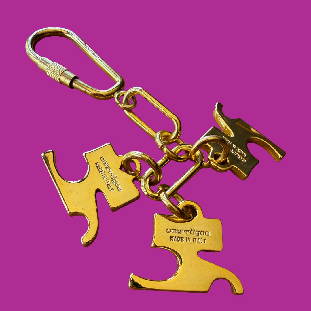 Courrèges 1990s Gold and Pink Enamel Logo Charm Keychain — vintage 1990s Courrèges accessory in gold, pink, purple, white