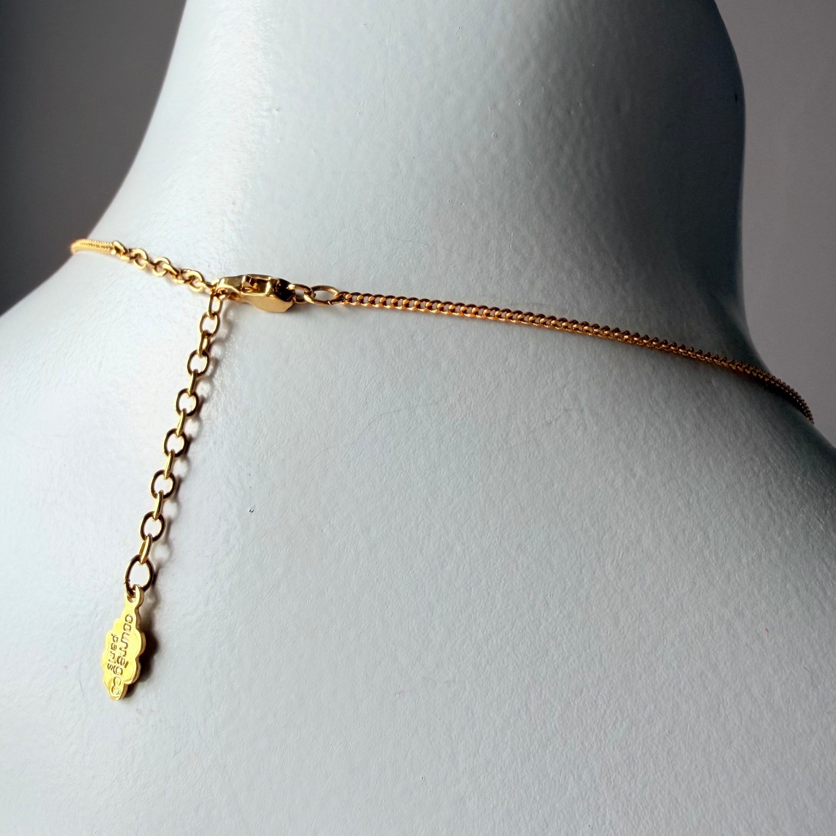 Courrèges Gold Tone Heart Logo Pendant Necklace — vintage 1990s Courrèges jewellery in gold, silver