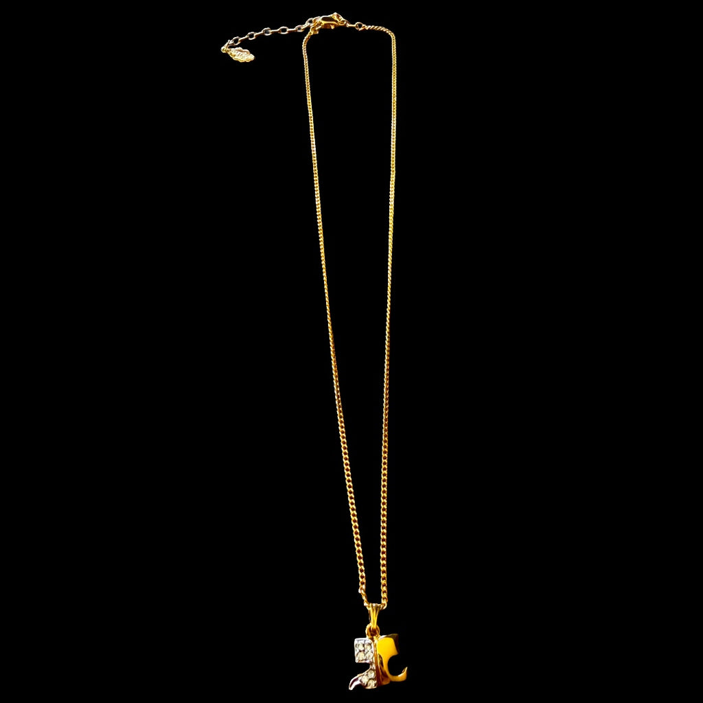 1990s Courrèges Gold and Silver Tone Rhinestone Puzzle Piece Pendant Necklace — vintage 1990s Courrèges jewellery in gold, silver