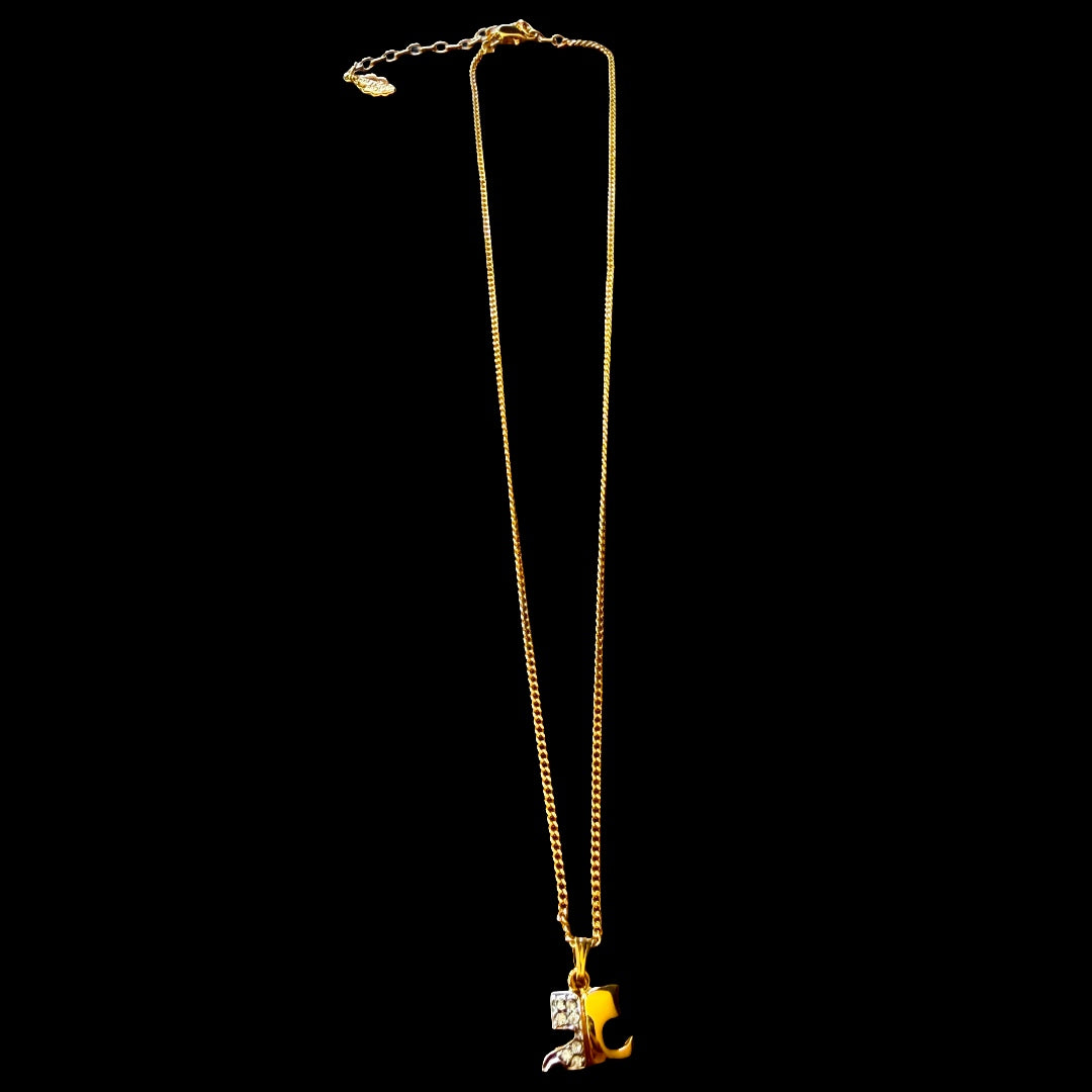 1990s Courrèges Gold and Silver Tone Rhinestone Puzzle Piece Pendant Necklace — vintage 1990s Courrèges jewellery in gold, silver