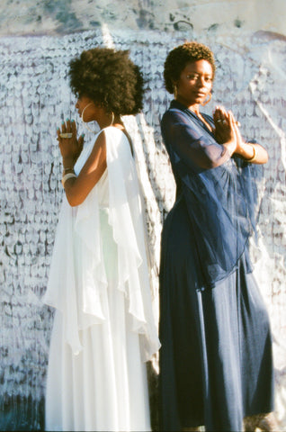 Lizzy Jeff and Moon Flower model these ethereal vintage bohemian maxi dresses from the 1970s.