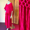 Beautiful vintage magenta dyed fringe Moroccan caftan available at Empress Vintage. 