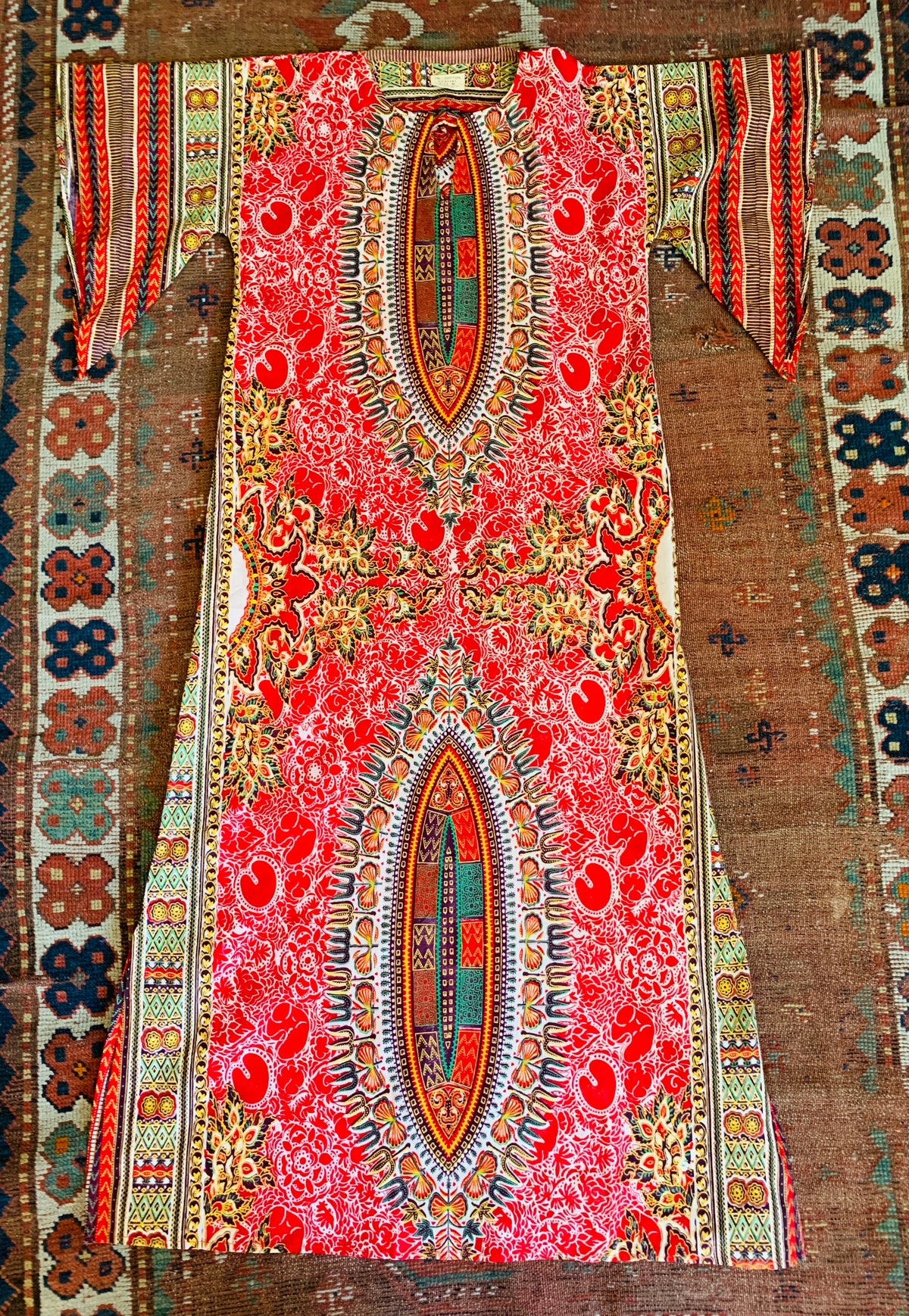 This vintage caftan was made in Pakistan in the 1970s.  It is now available from Empress Vintage in California.
