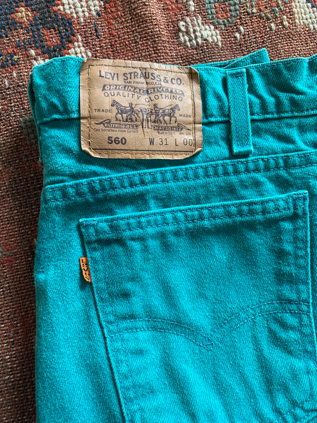 Seafoam Green Orange Tab Levi's Denim Shorts — vintage Levi's bottoms in green, blue