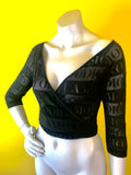 Sheer Black Moschino Cross Body Blouse. Sold exclusively at Empress Vintage in Berkeley, CA.