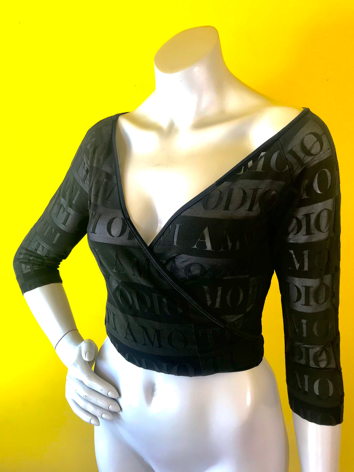 Sheer Black Moschino Cross Body Blouse. Sold exclusively at Empress Vintage in Berkeley, CA.