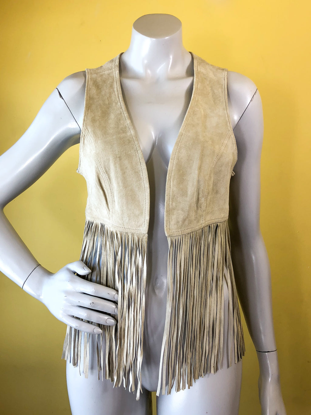 Brown Suede Leather Fringe Vest sold exclusively at Empress Vintage in Berkeley, CA.