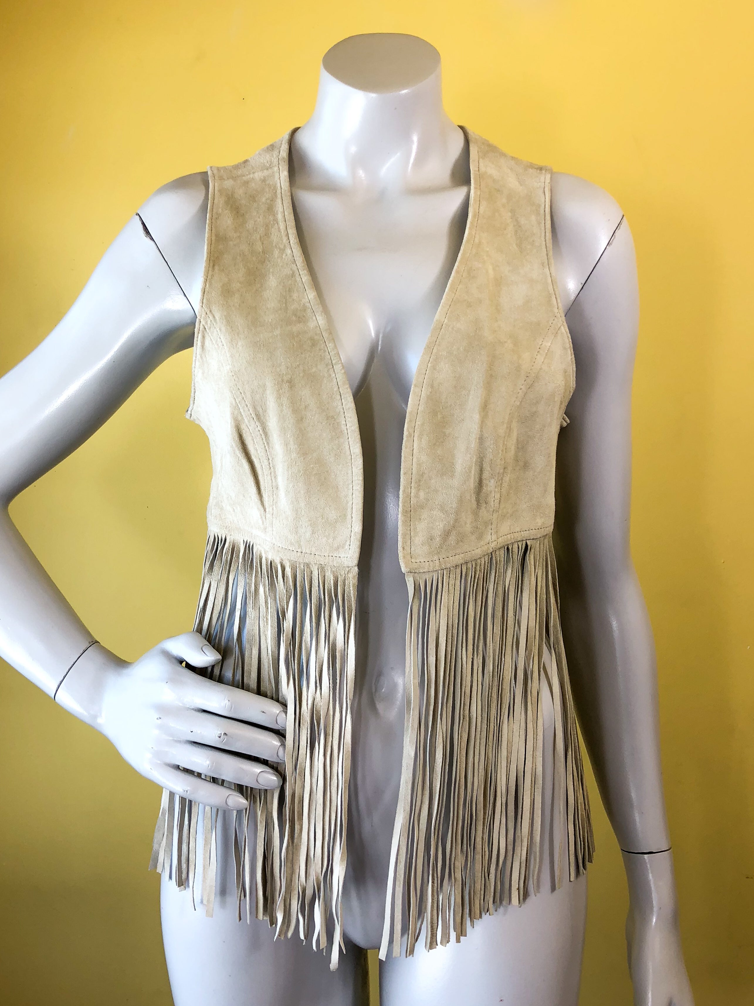 Brown Suede Leather Fringe Vest sold exclusively at Empress Vintage in Berkeley, CA.