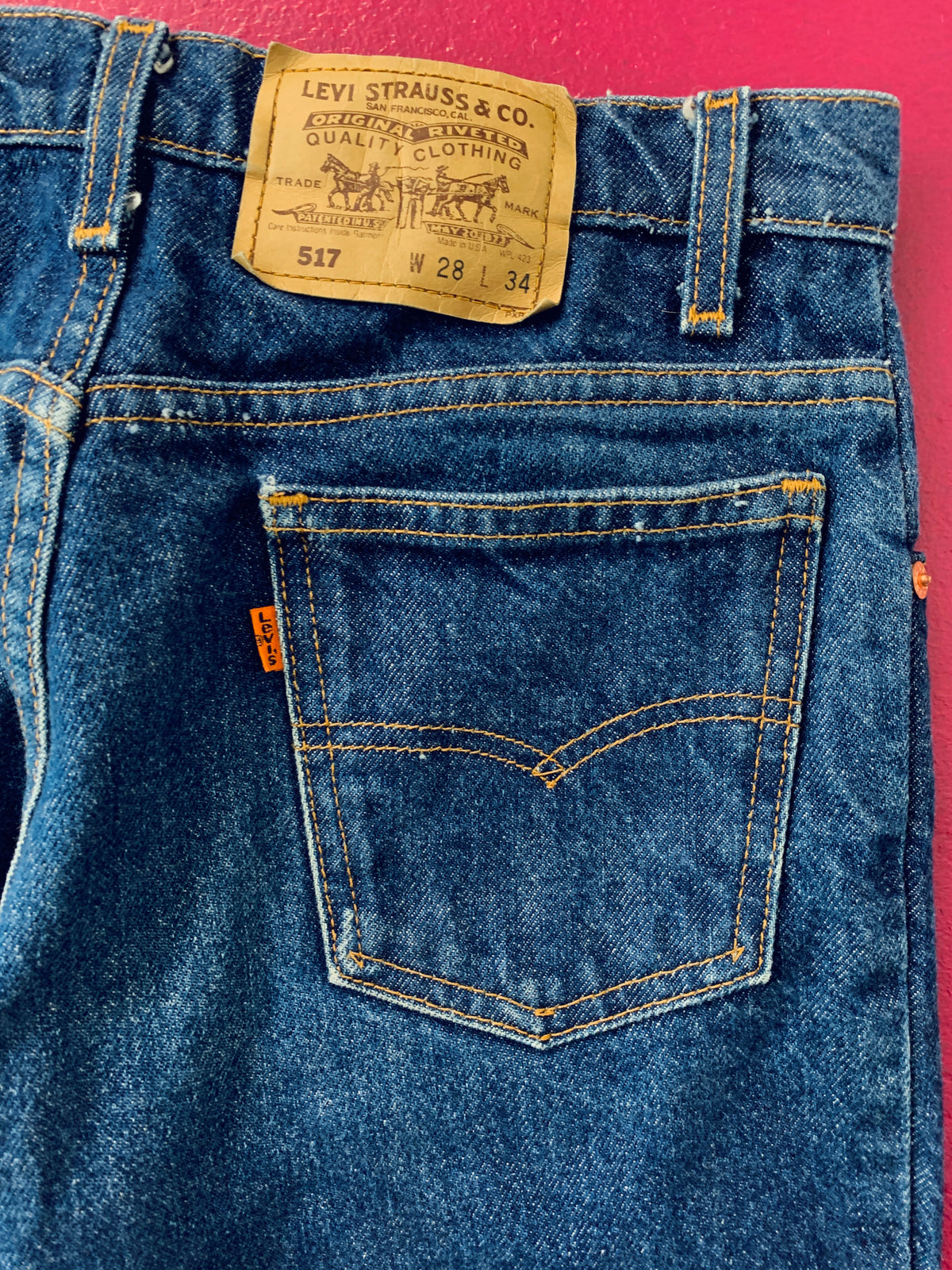 Orange Tab High Waisted Cut Off Levi's Jeans — vintage 1990s Levi's bottoms in orange