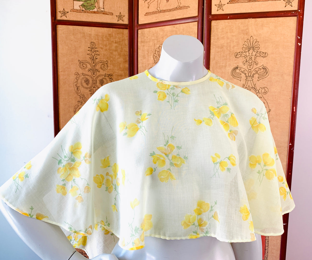 Pale Yellow 1970s Sheer Cape — vintage 1970s jacket in yellow