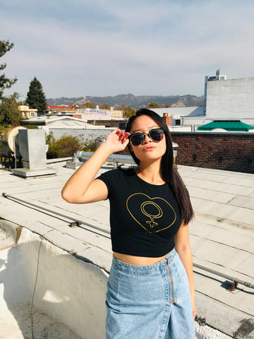 Handmade in Berkeley, CA, this black crop top with gold screen printing is a must for your wardrobe!  Come visit us at Empress Vintage on Alcatraz Ave.