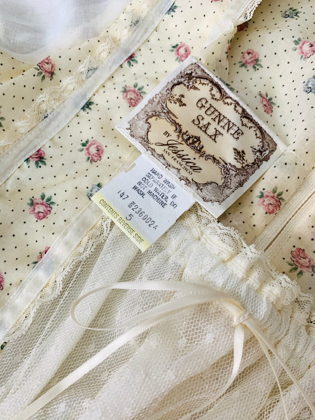 The Gunne Sax label is seen here on a floral print 1970s dress.