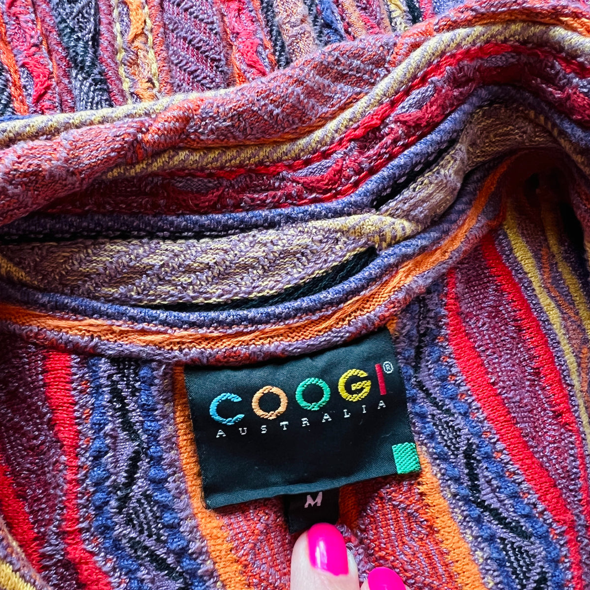 Coogi One Piece Jumpsuit — vintage Coogi set in black, orange, yellow, purple, multicolour