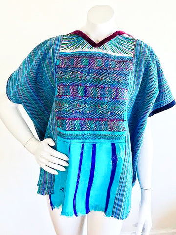 Aqua Rainbow Striped Woven Guatemalan Huipil, sold exclusively at Empress Vintage in Berkeley, CA.